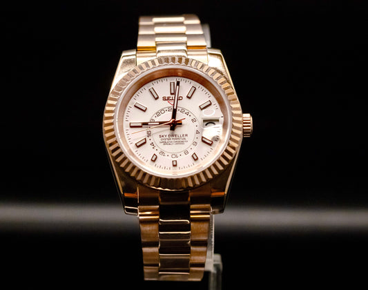 Rose Gold Seiko Mod Sky-Dweller watch with white dial and fluted bezel, luxury affordable timepiece by Kingdom Watch Company.