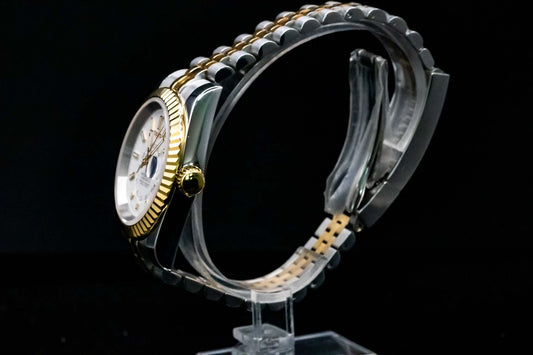 Angled shot of SeikoMod Sky White showing stainless steel case and elegant white dial