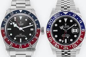 Rolex GMT vs Tudor GMT comparison featuring luxury watches side by side.