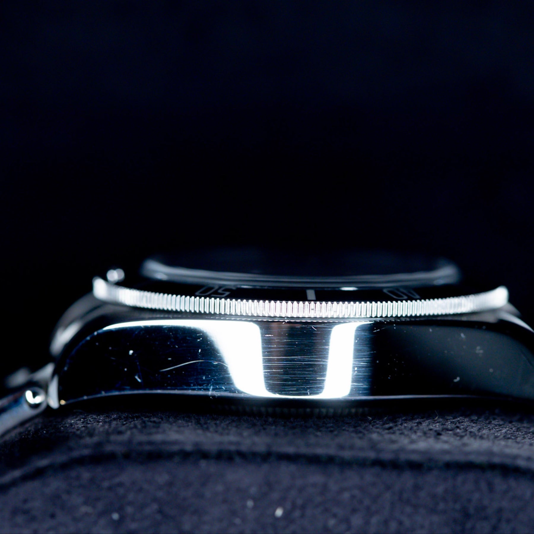 Side view of the Tudor Black Bay Heritage 79230B showcasing its polished case and elegant wristband.