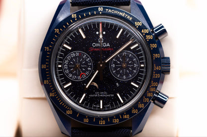 Close-up of the Omega Speedmaster Blue Side of the Moon watch showcasing its starry dial and moonphase display.