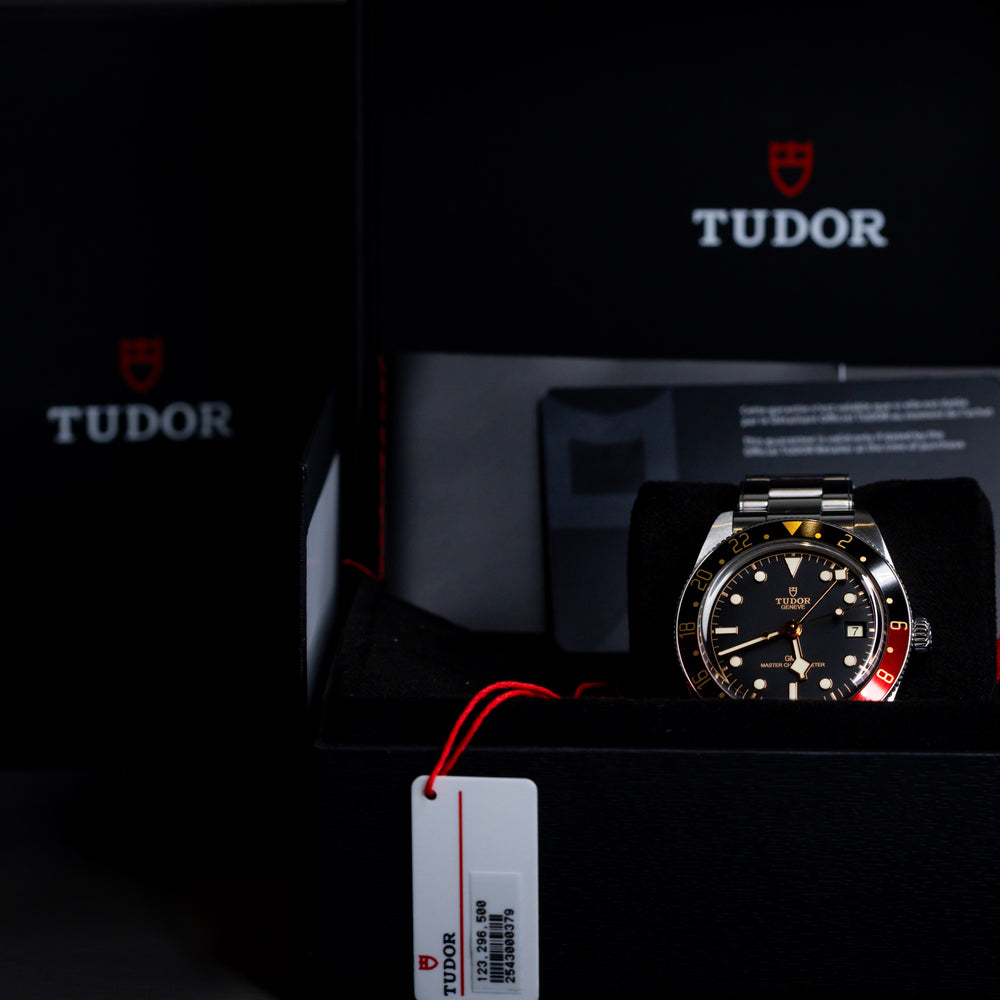 Tudor Black Bay 58 GMT Coke watch displayed in its box with warranty and manual.