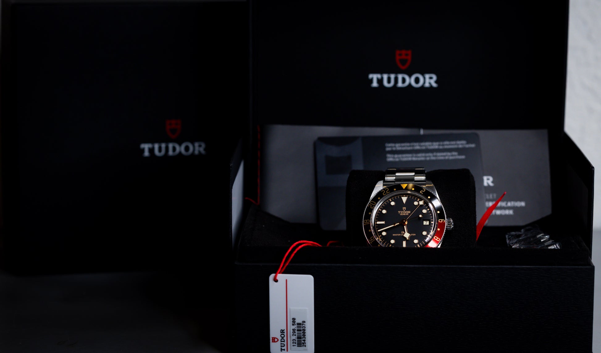 Tudor Black Bay 58 GMT Coke watch displayed in its box with warranty and manual.