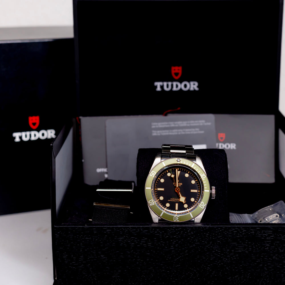 Tudor Black Bay Harrods Edition 41mm watch in presentation box with black and green design.