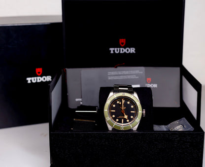 Tudor Black Bay Harrods Edition 41mm watch in presentation box with black and green design.
