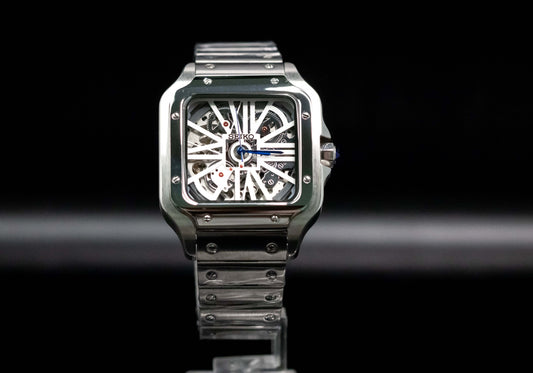 SeikoMod Santos White Skeleton watch with a skeleton dial and stainless steel bracelet, showcasing intricate automatic movement.