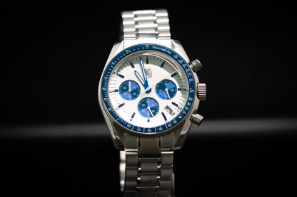 KWC Snoopy Chronograph watch with white dial and blue accents, featured in a stainless steel case.