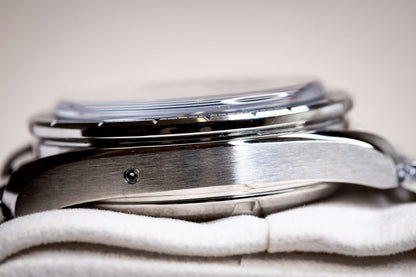 2025 OMG Speedmaster 38 Blue Dial Chronograph 324.30.38.50.03.001 – Full Set side view showing case and detail