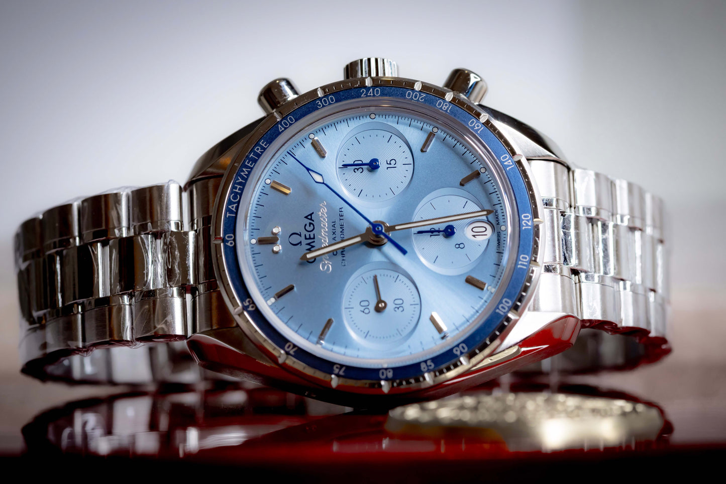 2025 OMG Speedmaster 38 Blue Dial Chronograph 324.30.38.50.03.001 – Full Set on stainless steel bracelet.