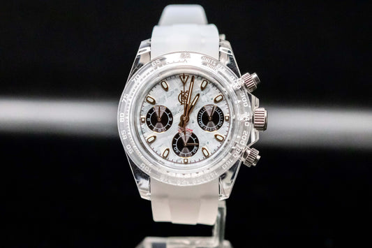 KWC White Ceramic Chronograph with black sub-dials and a white strap, showcasing modern design and rugged utility.