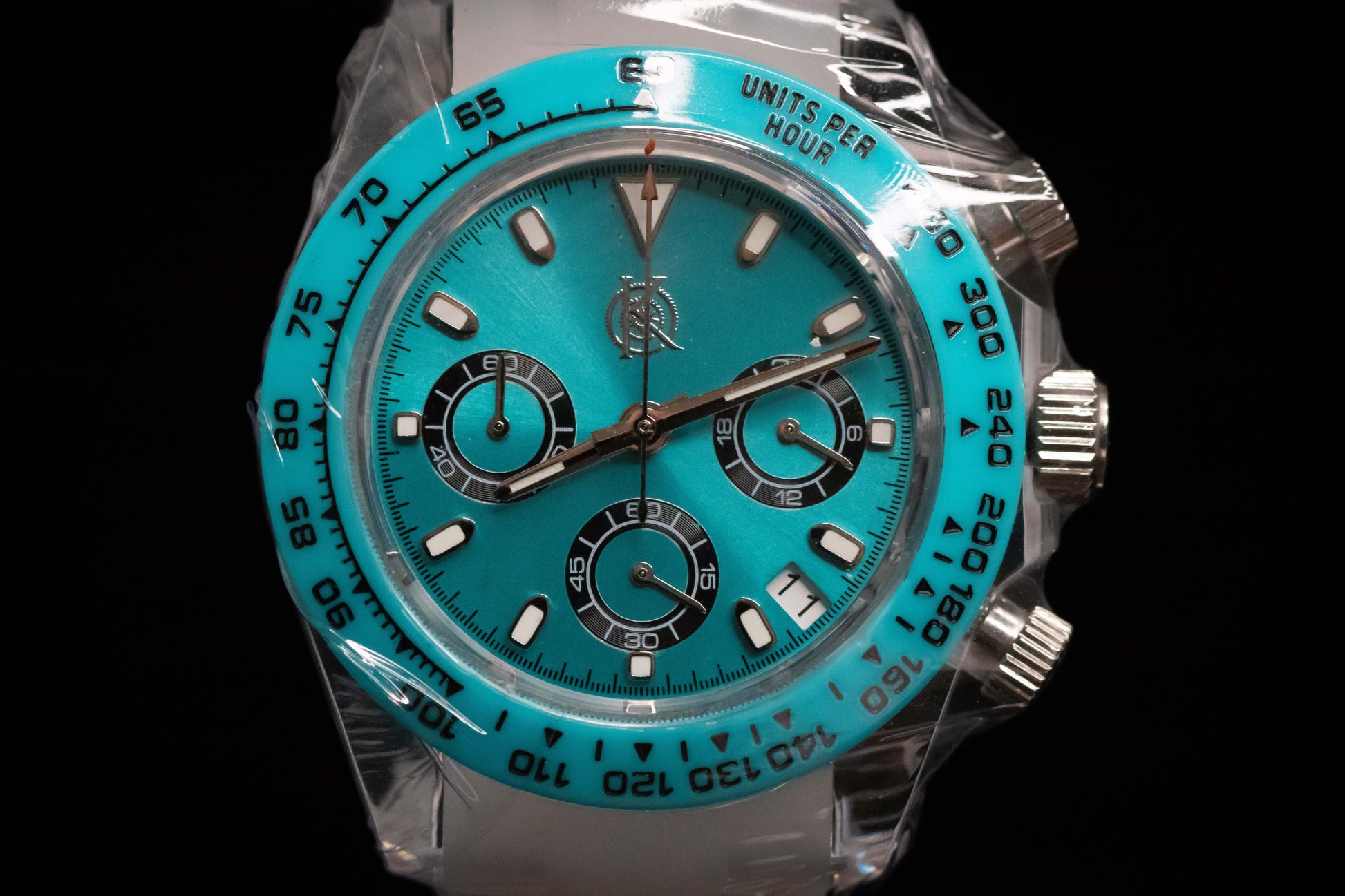 KWC Ice Ceramic Chronograph watch with a vibrant turquoise dial and ceramic bezel, showcasing modern design and utility.