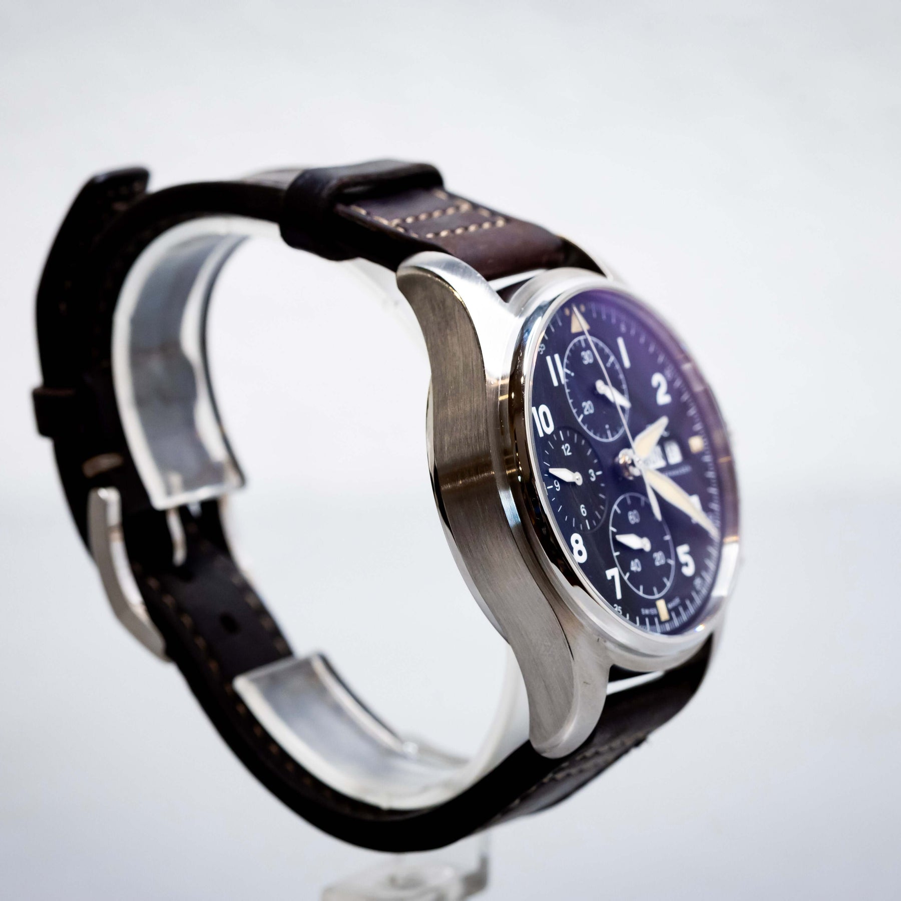 2022 IWC Pilot’s Watch Chronograph Spitfire 41mm  Ref. IW387903 | Full Set displayed on a stand.