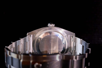 Rolex Datejust 36 full set back view showing the Oystersteel case and bracelet details.