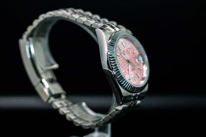 Seiko Mod Pink Land Dweller watch with salmon dial and stainless steel bracelet, showcasing elegant design and durability.