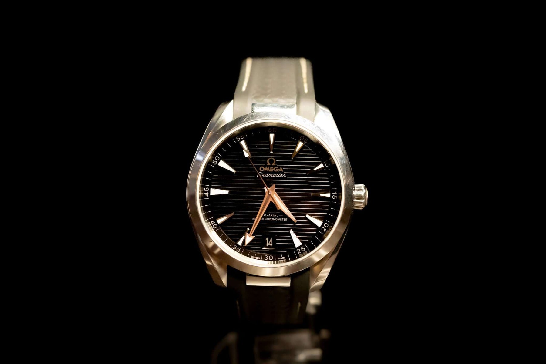 2022 Omega Seamaster Aqua Terra watch with black teak-pattern dial and stainless steel case
