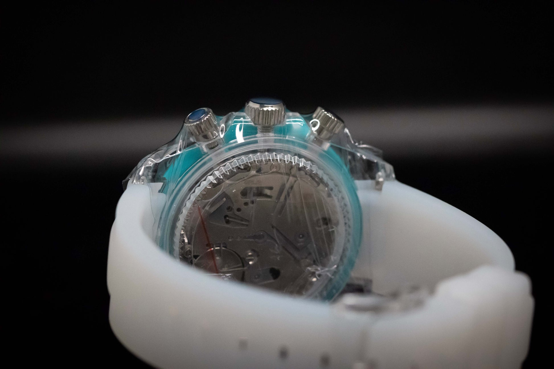 KWC Ice Ceramic Chronograph with clear case and light blue details, showcasing its modern design and functionality.