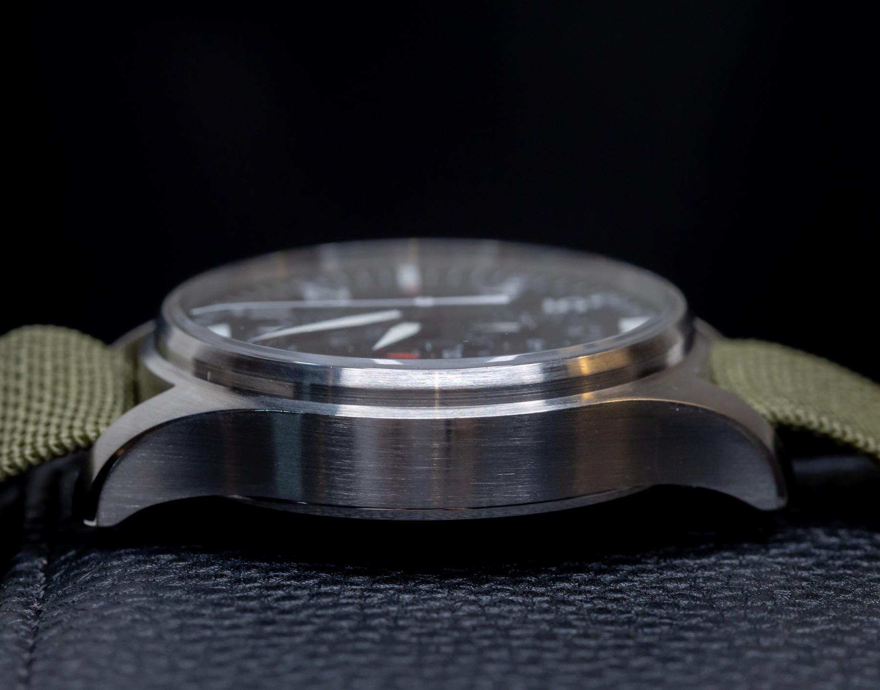 IWC Pilot's Watch Chronograph 43mm side view showcasing stainless steel case and green strap