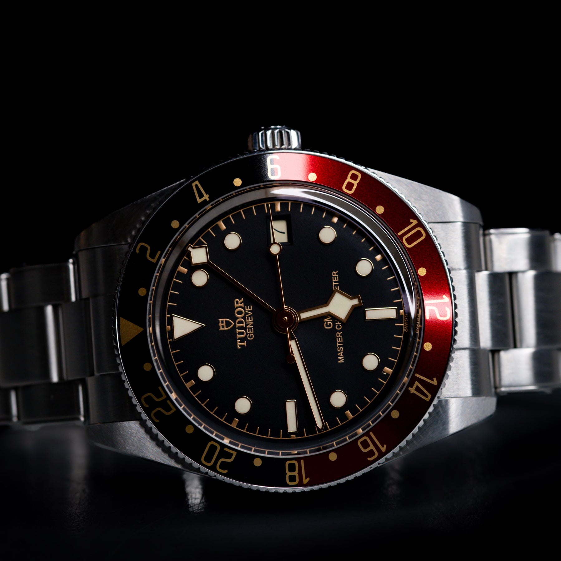 Tudor Black Bay 58 GMT Coke watch with black dial and red bezel, automatic movement, 39mm case size.
