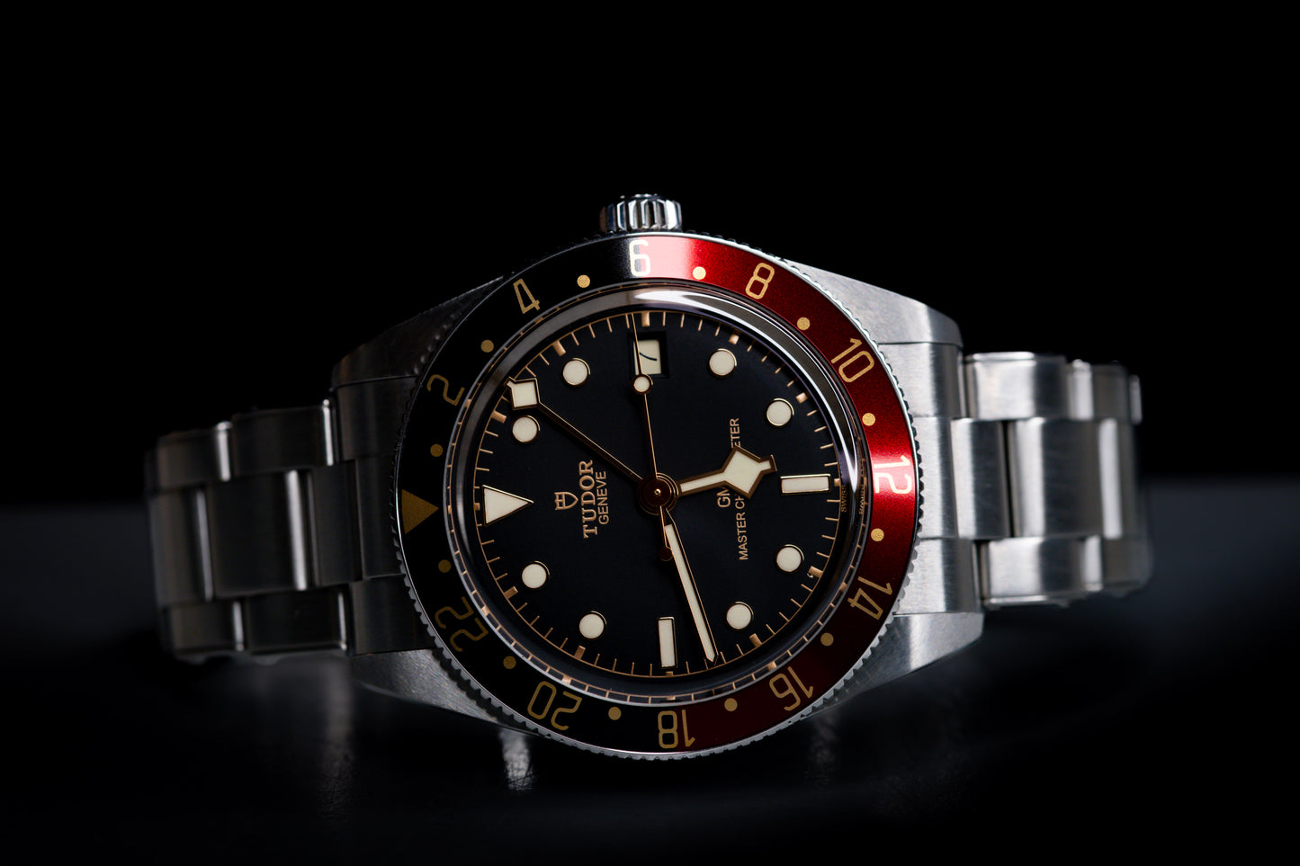 Tudor Black Bay 58 GMT Coke watch with black dial and red bezel, automatic movement, 39mm case size.