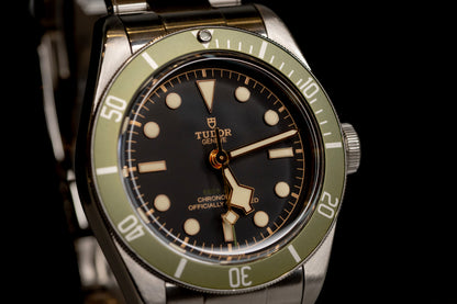 Tudor Black Bay Harrods Edition 41mm watch with green bezel and stainless steel strap, model M79230G-0001.