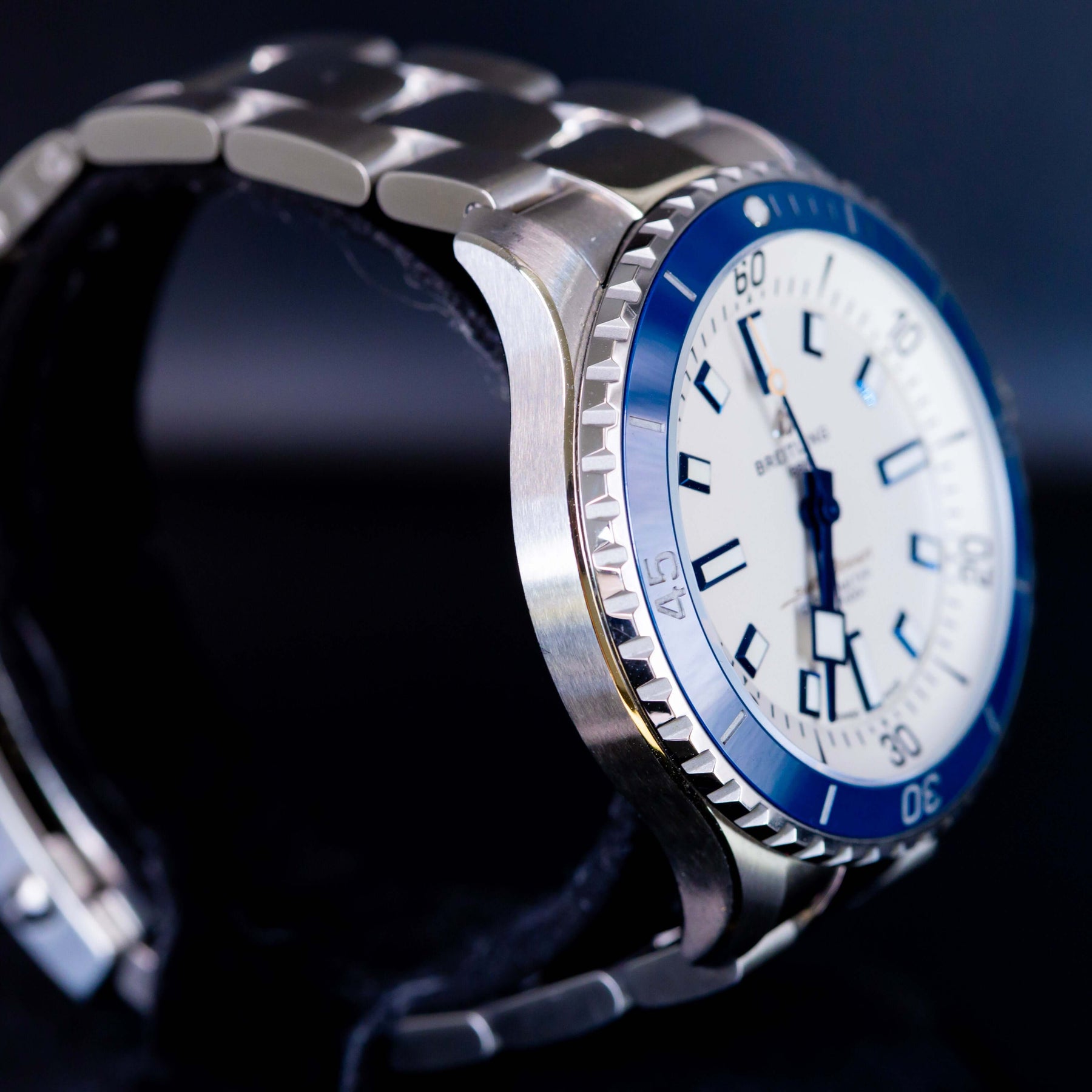 Breitling Superocean Automatic 42 A17375 wristwatch with stainless steel bracelet and blue bezel.
