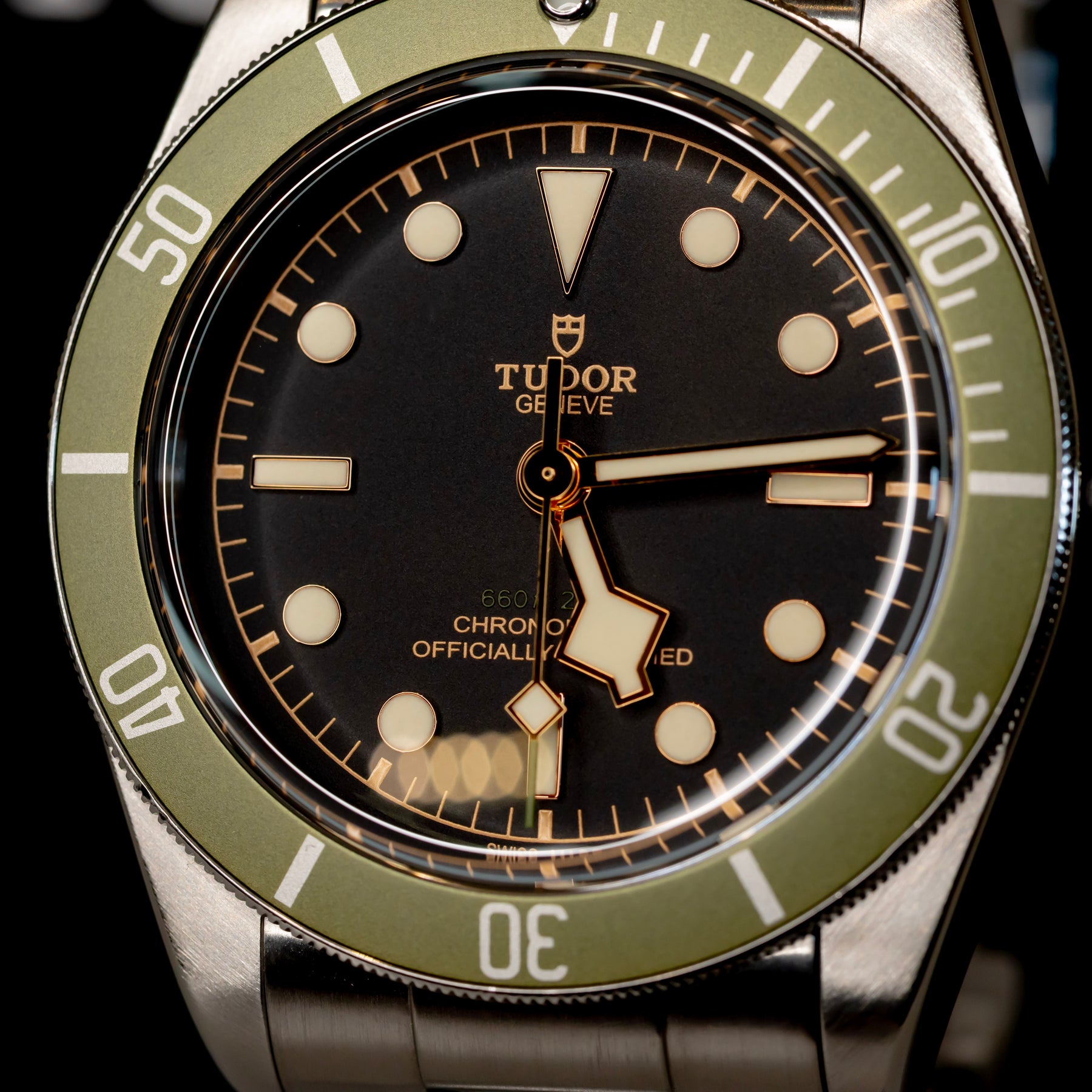 Tudor Black Bay Harrods Edition 41mm watch with green bezel and stainless steel detailing.