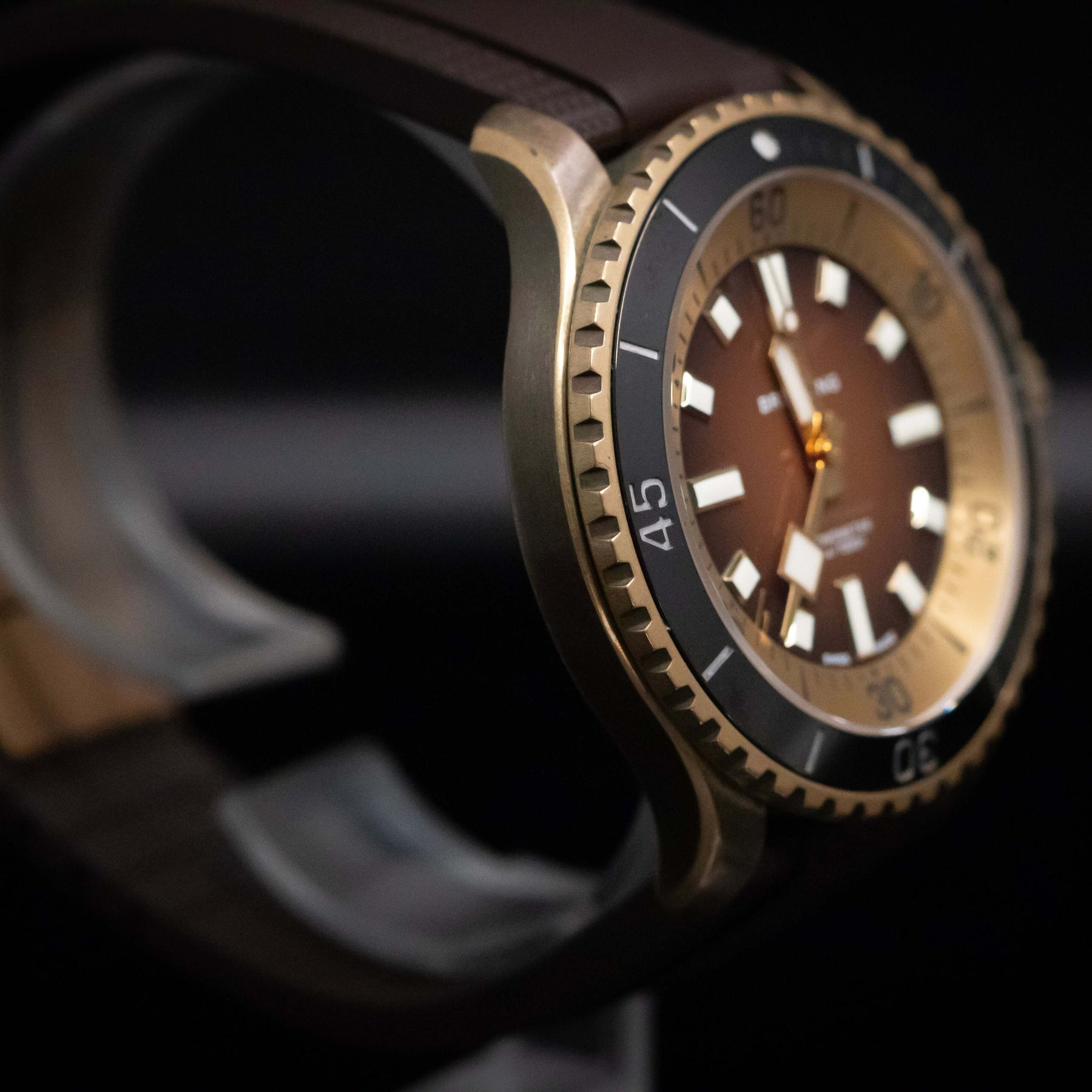 Breitling SuperOcean Automatic 44mm watch with bronze case and brown dial, showcasing bold design and style.