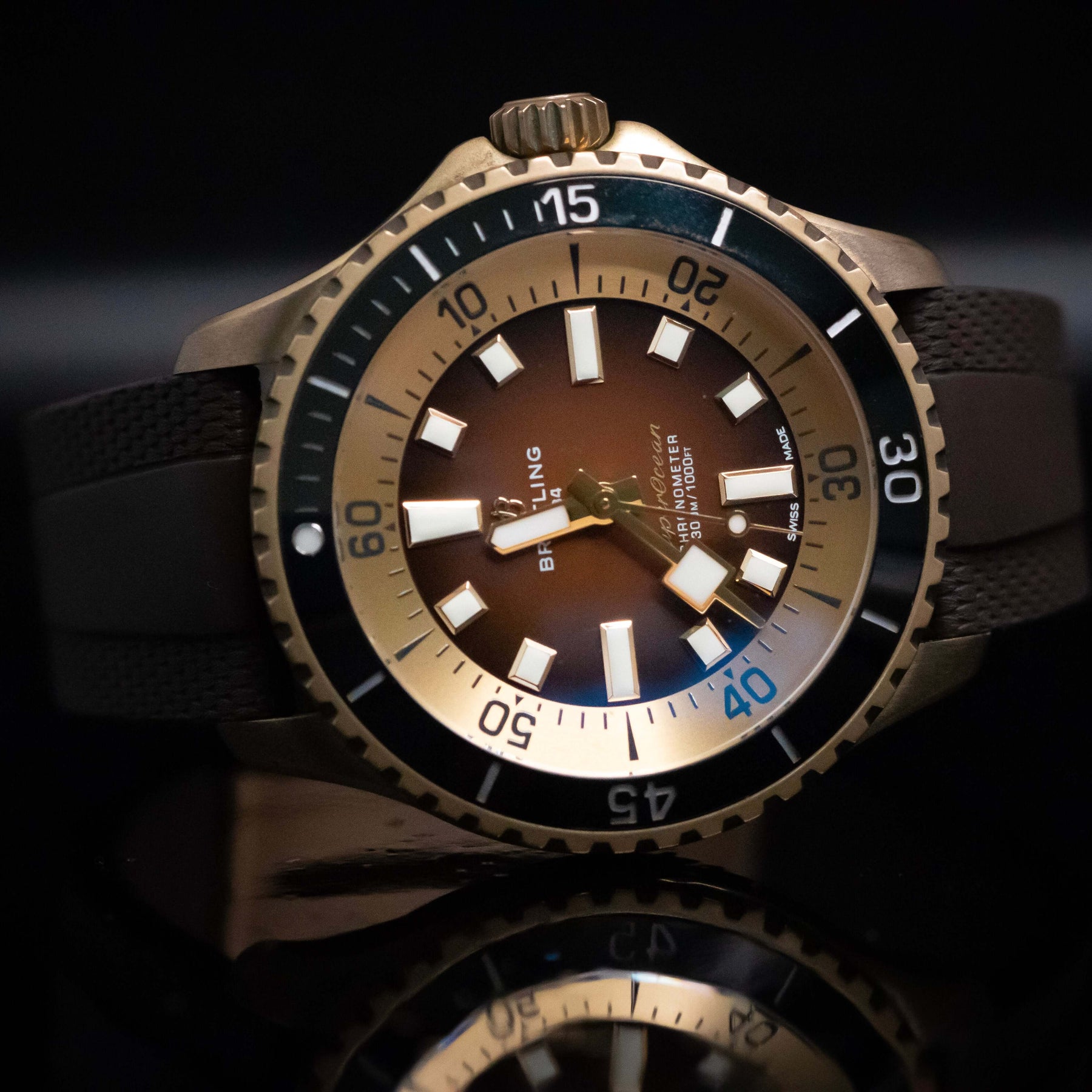 Breitling SuperOcean Automatic 44mm in bronze with brown dial and black rubber strap.