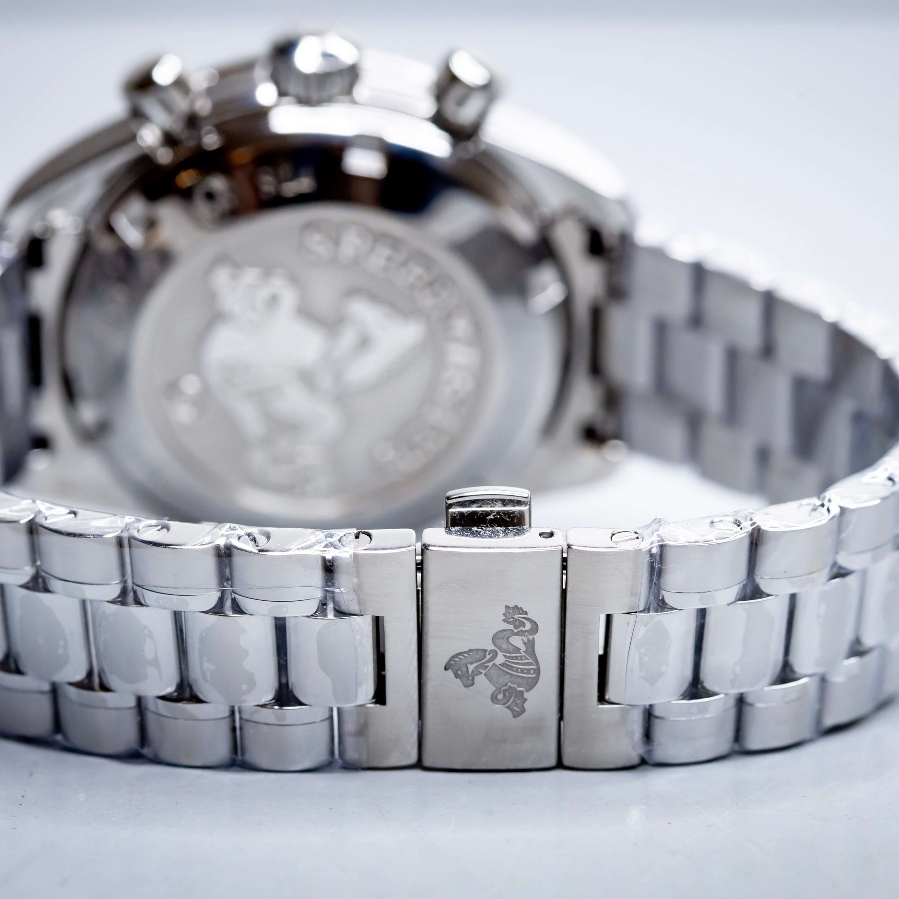 2025 OMG Speedmaster 38 Blue Dial Chronograph 324.30.38.50.03.001 – Full Set back view showing stainless steel bracelet.