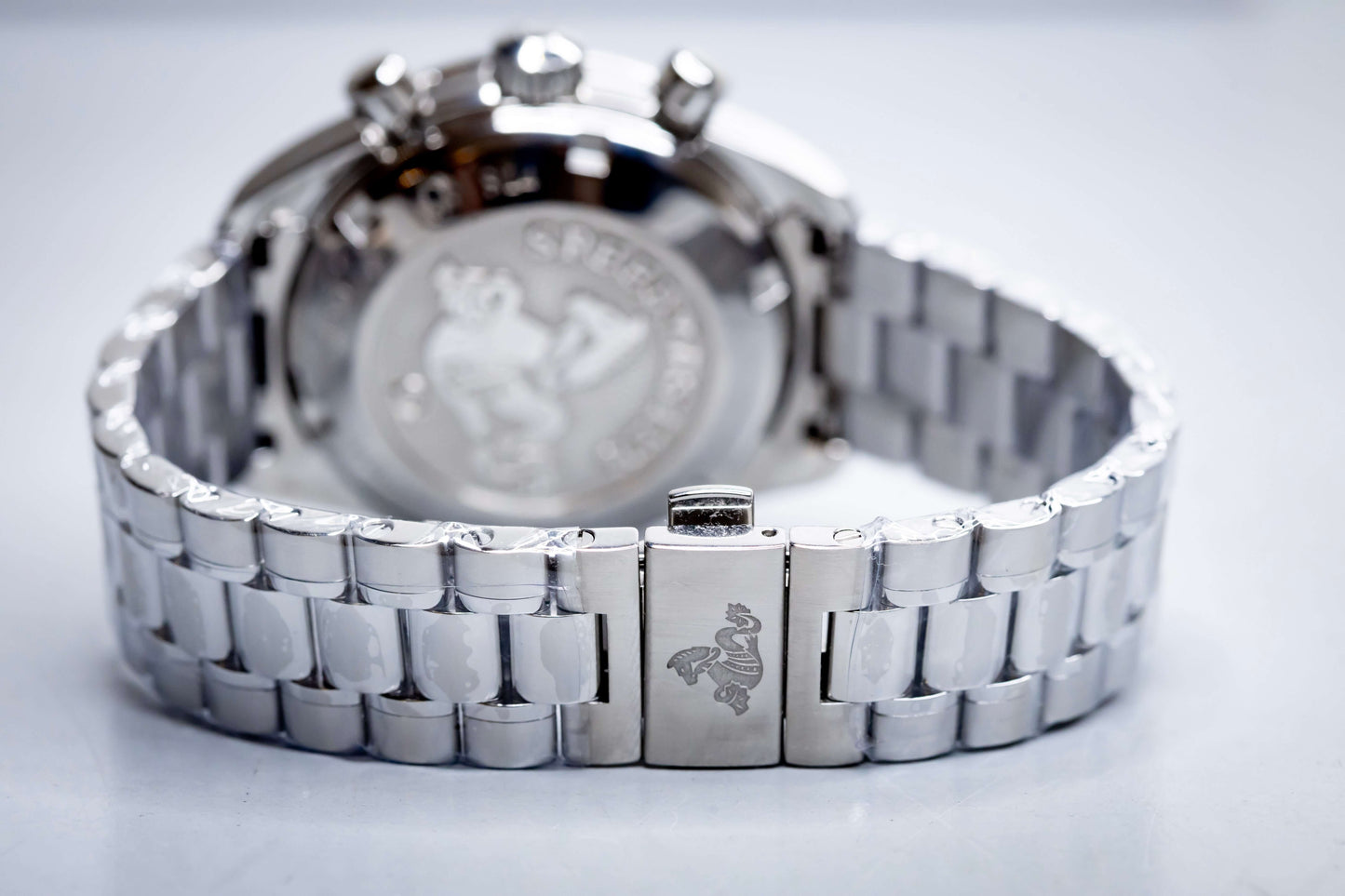 2025 OMG Speedmaster 38 Blue Dial Chronograph 324.30.38.50.03.001 – Full Set back view showing stainless steel bracelet.