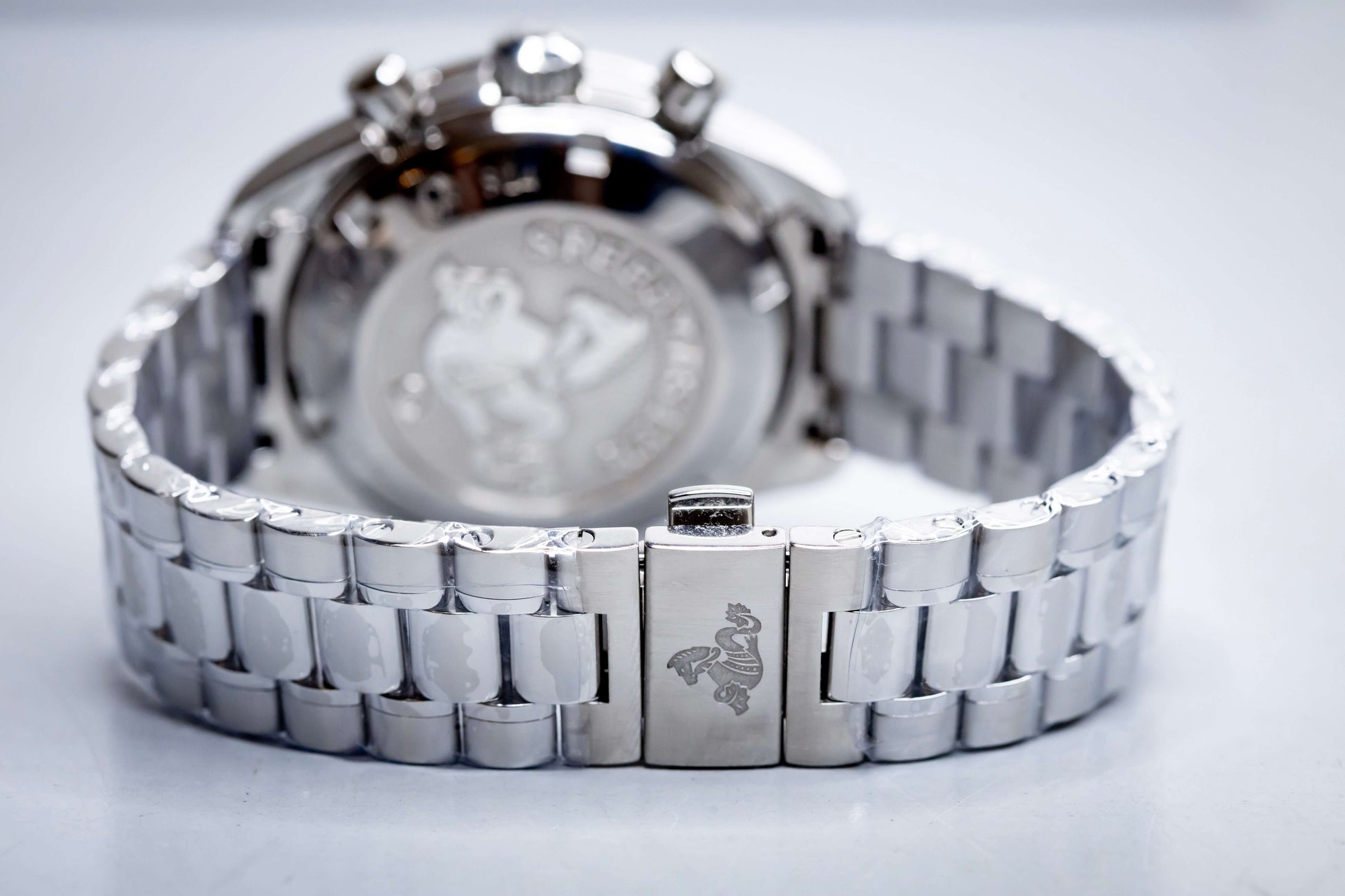 2025 OMG Speedmaster 38 Blue Dial Chronograph 324.30.38.50.03.001 – Full Set back view showing stainless steel bracelet.