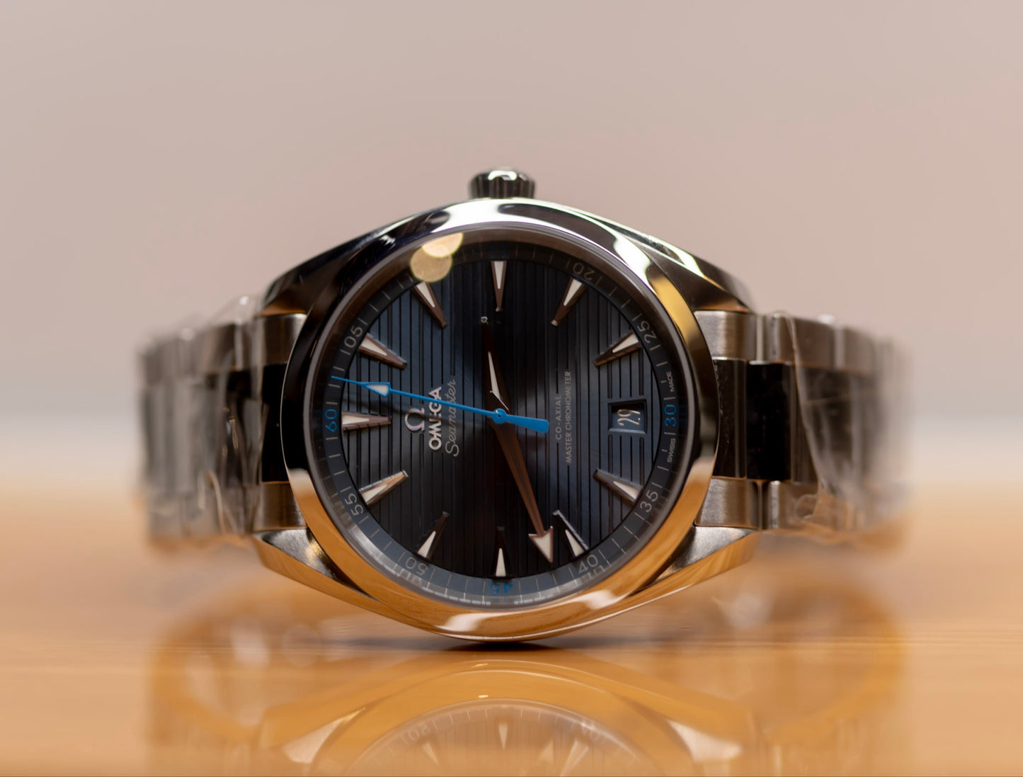 2023 Omega Seamaster Aqua Terra 41mm blue dial watch showcasing sun-brushed texture and stainless steel design.