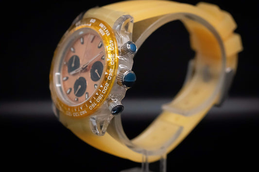 KWC Orange Ceramic Chronograph watch with a lightweight ceramic case and yellow silicone strap.