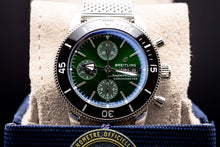 2025 BNIB - Breitling SuperOcean Chronograph Green 44mm- Breitling A13313 on display with green dial and stainless steel case.