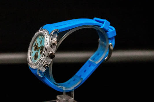 KWC Blue Ceramic Chronograph watch featuring a blue silicone strap and clear case displaying a stylish dial.