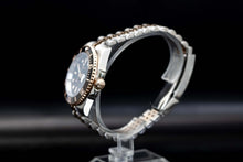 Side profile of Two Tone Root Beer Diver mod with polished case and custom bezel