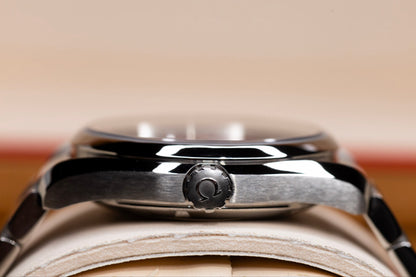 Side view of the Omega Seamaster Aqua Terra watch showcasing its case and crown.