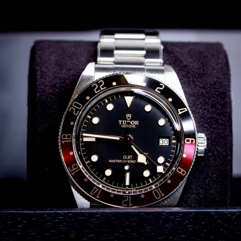 Tudor Black Bay GMT Coke watch displayed in original box, showcasing classic design and amazing condition.