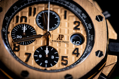 Audemars Piguet Royal Oak Offshore Chronograph 42mm close-up view showcasing rose gold dial and black subdials.