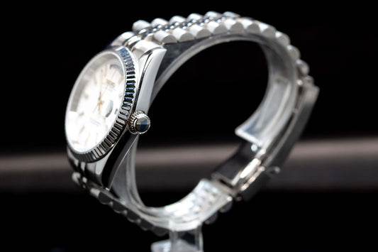 Seiko Mod White Day-Date watch showcasing white dial, gold indexes, and fluted stainless steel bezel design.