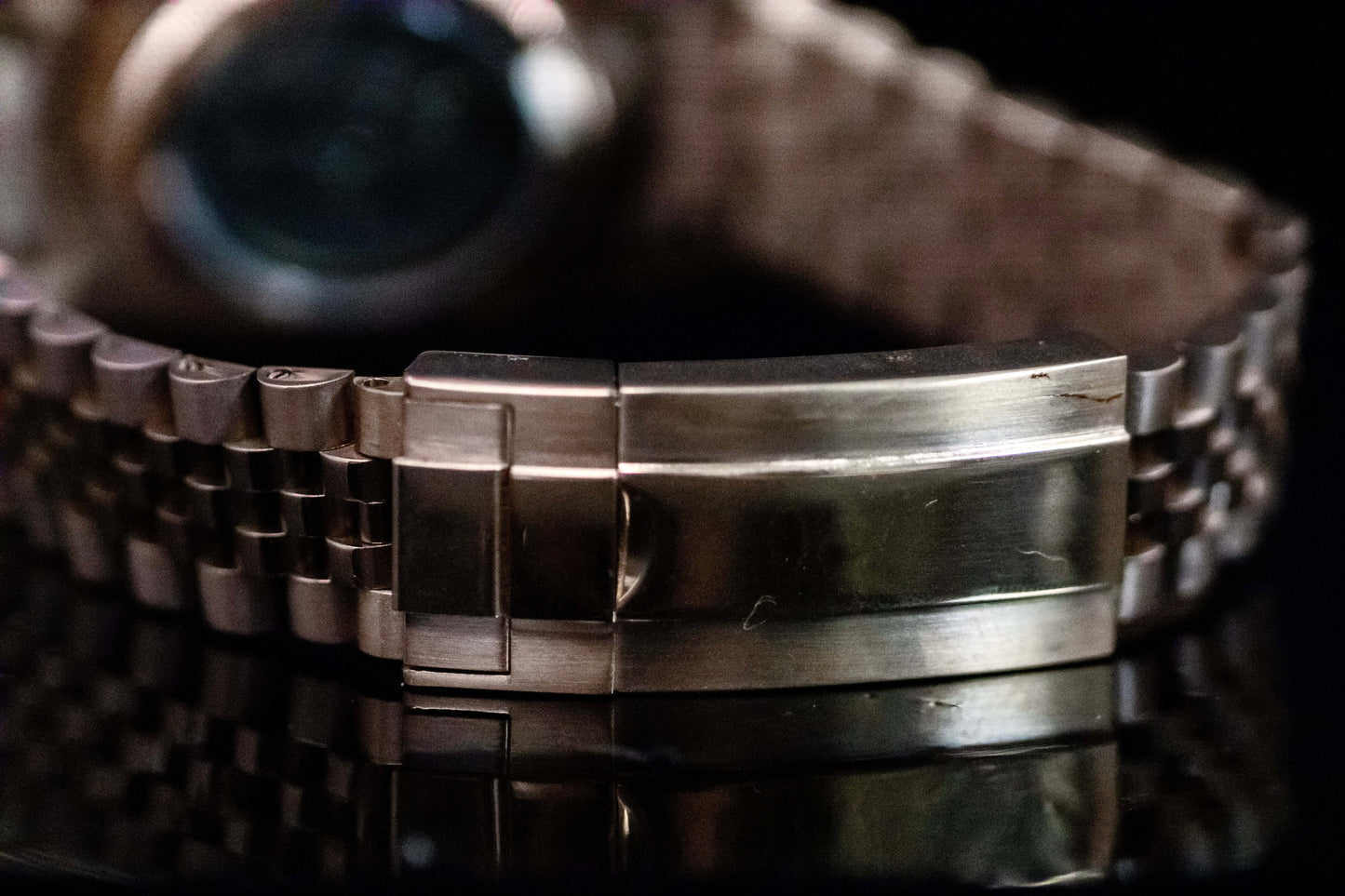 Close-up of the rose gold bracelet clasp of the Seiko Mod Land Dweller watch, showcasing its elegant design.