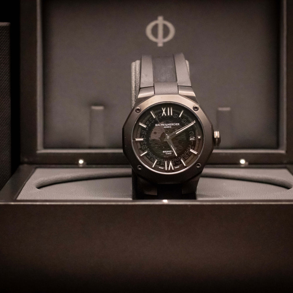 Baume & Mercier Riviera Automatic Skeleton watch Black-Steel ADLC (Ref. 10617) displayed in elegant box.