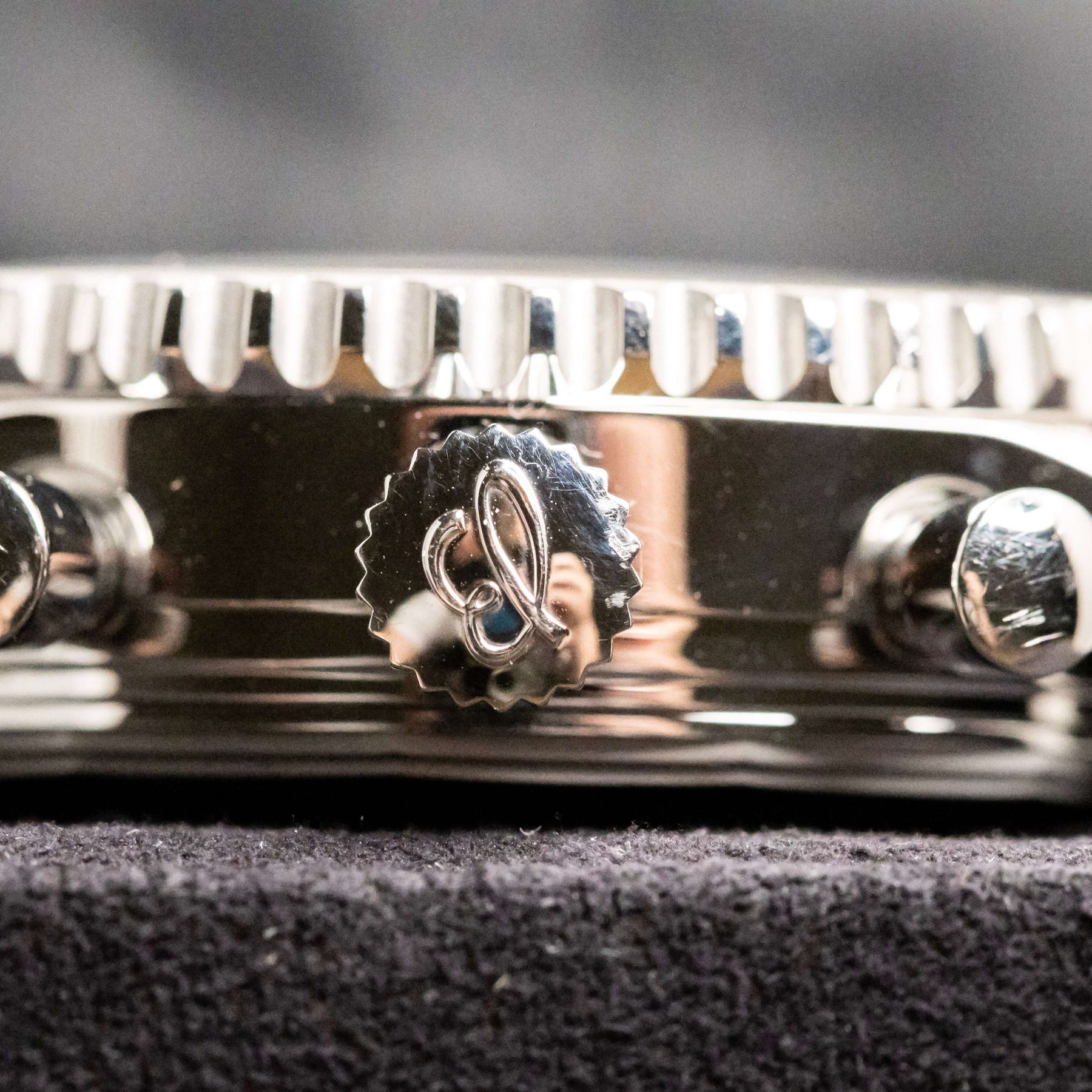 Close-up of the Breitling Navitimer World Chronograph watch case showcasing the distinctive bezel and pushers.