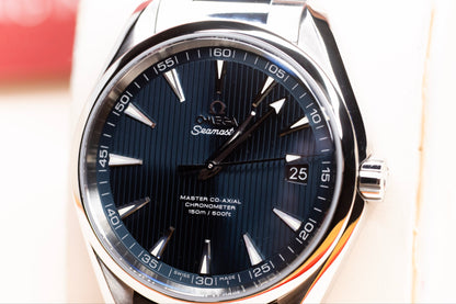Close-up of Omega Seamaster Aqua Terra watch with blue Teak Concept dial and polished finish.