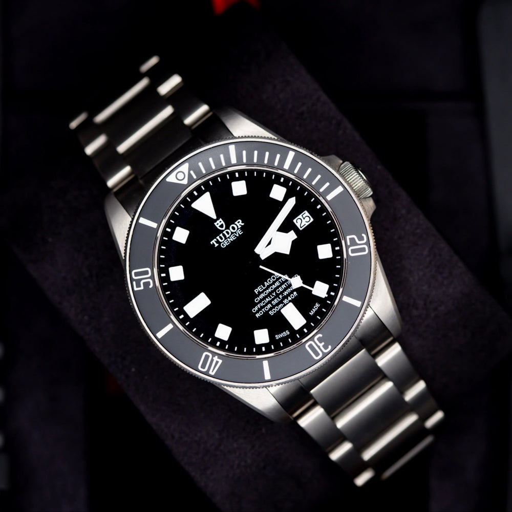 Tudor Pelagos dive watch showcasing a high-performance design with a titanium bracelet and black dial, perfect for underwater adventures.