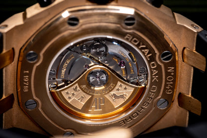 Audemars Piguet Royal Oak Offshore Chronograph 42mm rose gold watch case back view with intricate movement details.