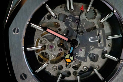Close-up of skeleton dial on Seiko Mod Oak Silver showing mechanical movement