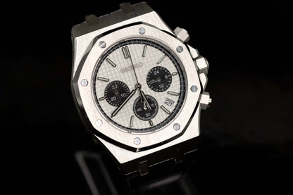 Seiko Mod Royal Oak Chronograph Panda watch with a white dial and black sub-dials, showcasing its elegant design.