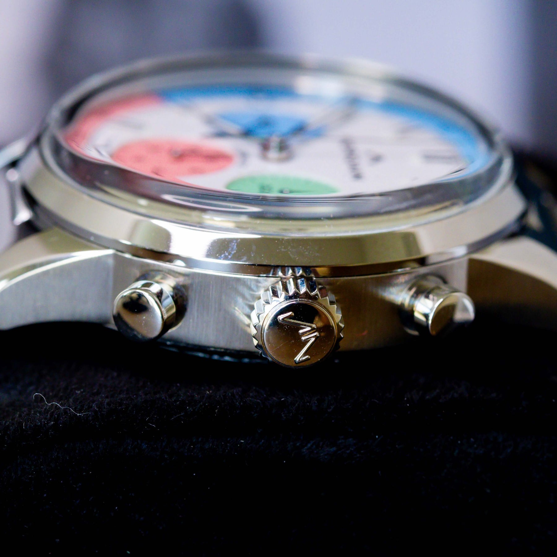 Norqain Freedom 60 Chrono Ice Cream Limited Edition watch side view with colorful dial and stainless steel strap.