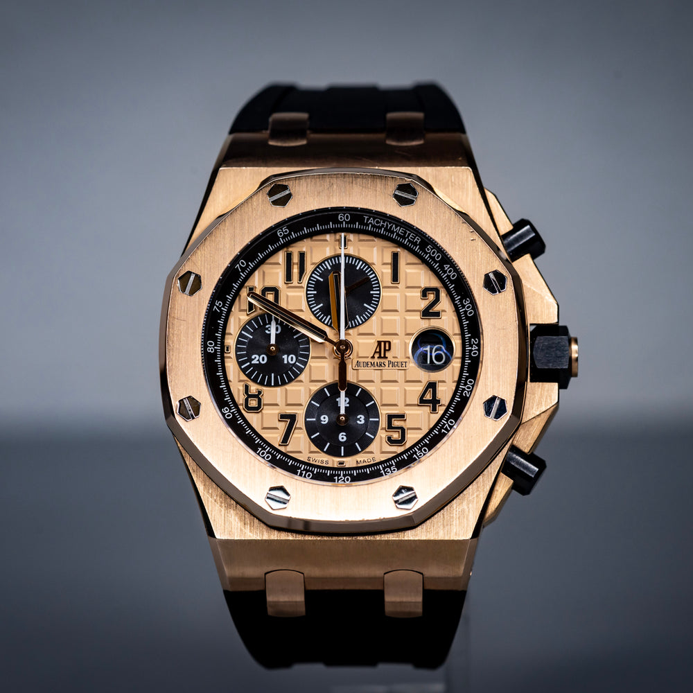 Audemars Piguet Royal Oak Offshore Chronograph 42mm Rose Gold 26470OR with black rubber strap and intricate dial.